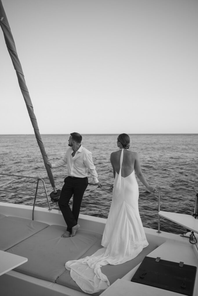 Romantic sunset swim during Santorini elopement